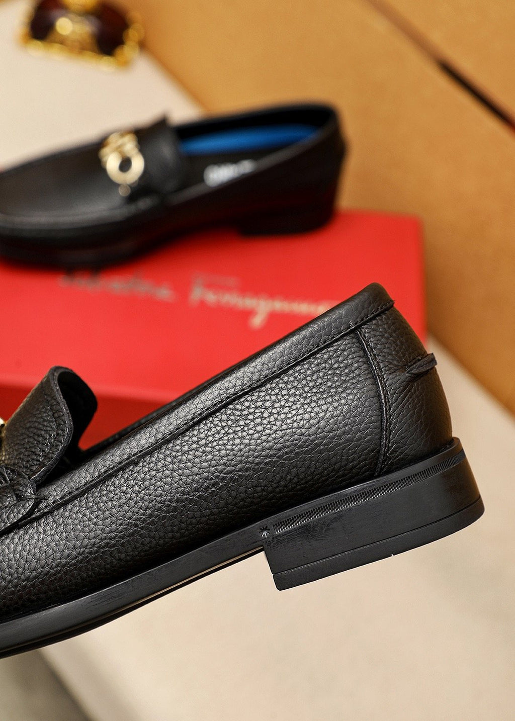 Ferragamo Black Textured Leather Loafers — detail