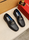 Ferragamo Black Textured Leather Loafers — hero