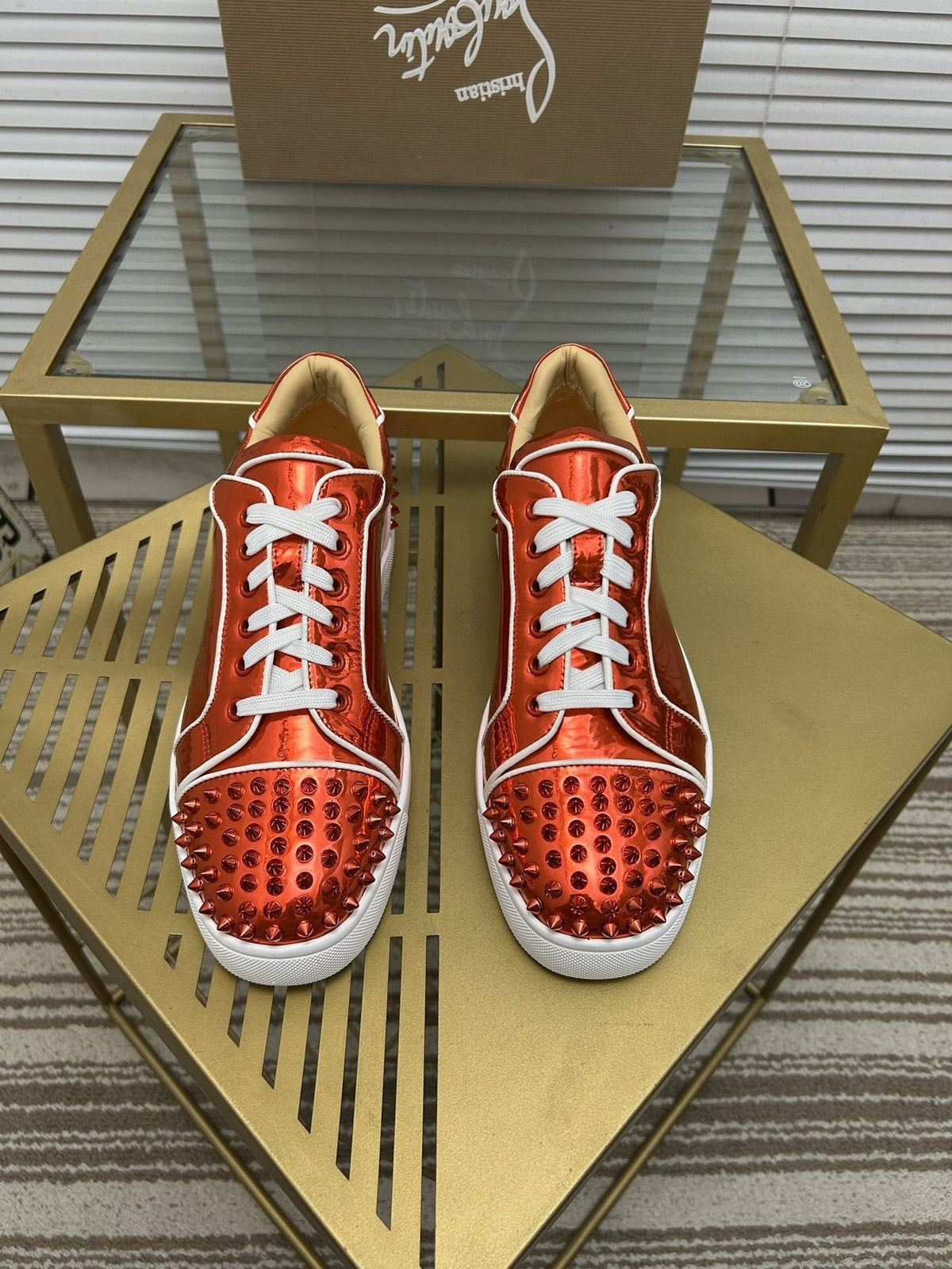 Christian Louboutin Metallic Red Studded Sneakers — front