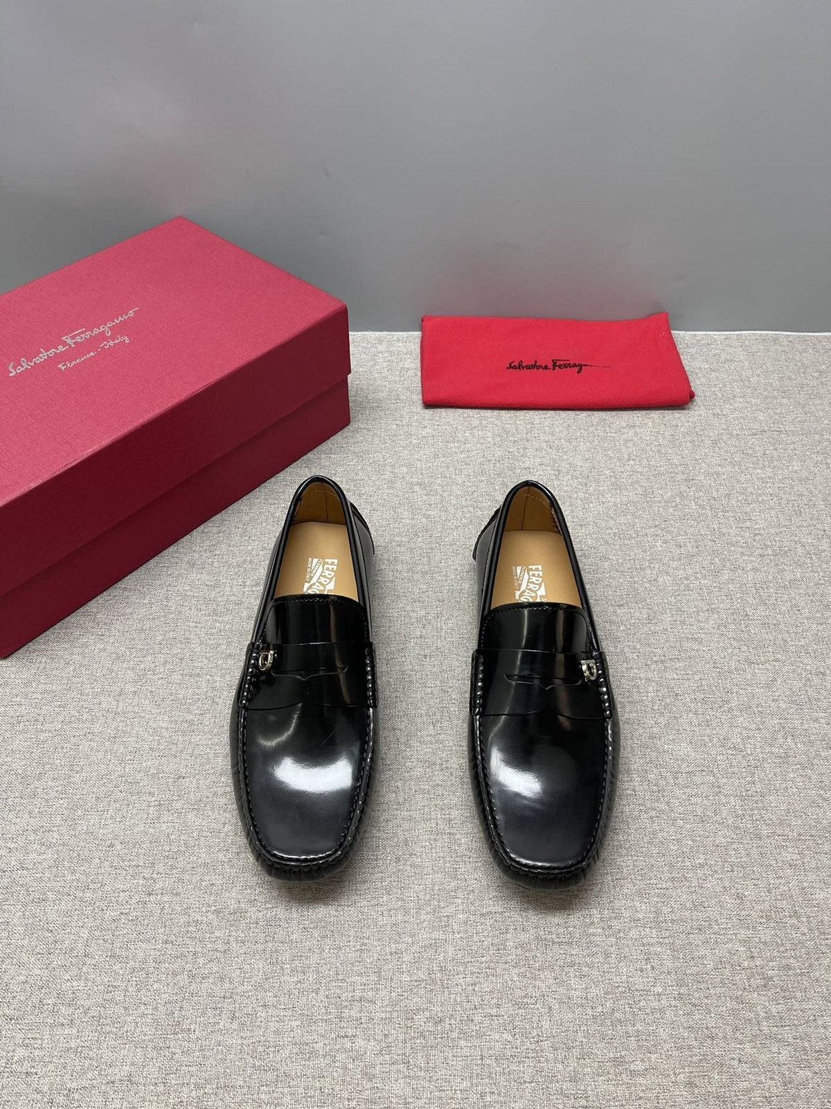 Ferragamo Black Buckle Driving Loafers — front