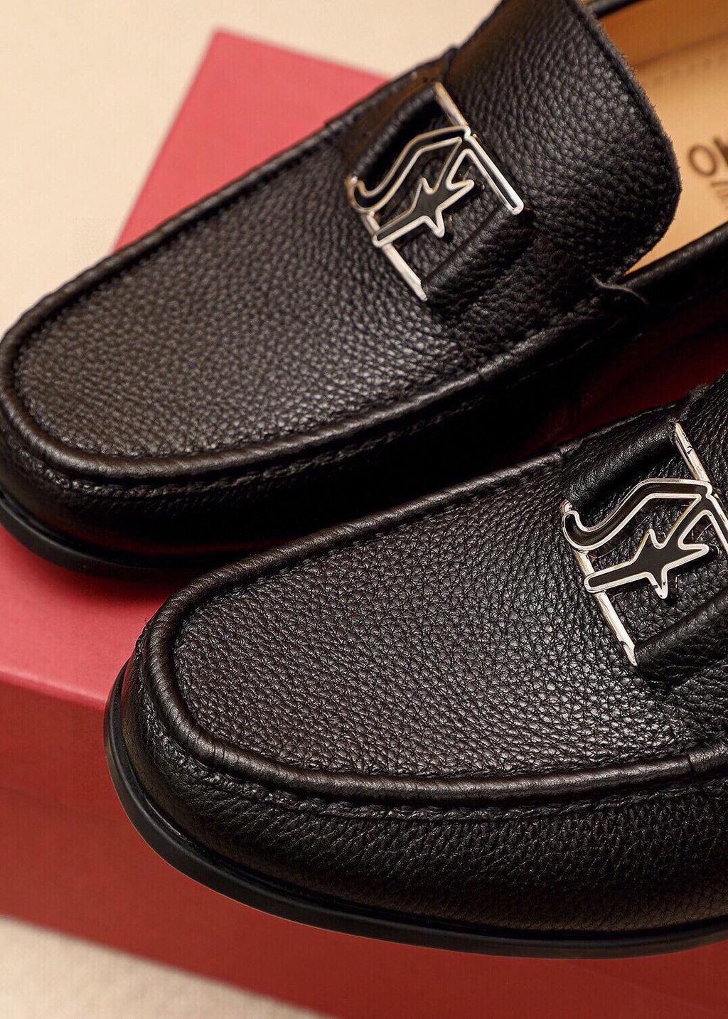 Ferragamo Black Pebbled Leather Loafers — detail