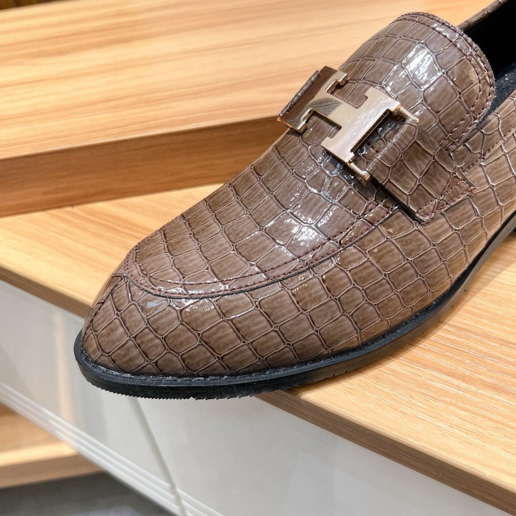 Hermès Brown Textured Loafers — front
