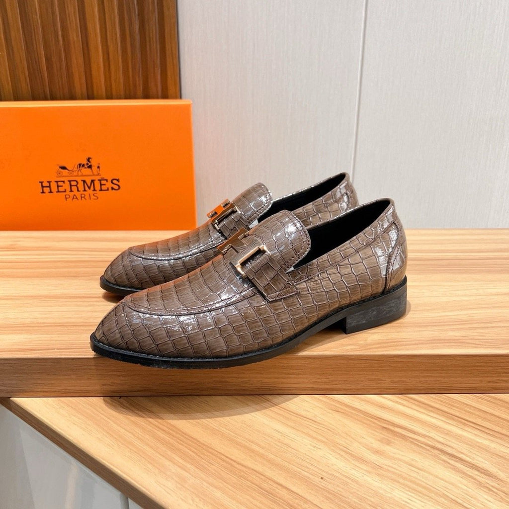 Hermès Brown Textured Loafers — front