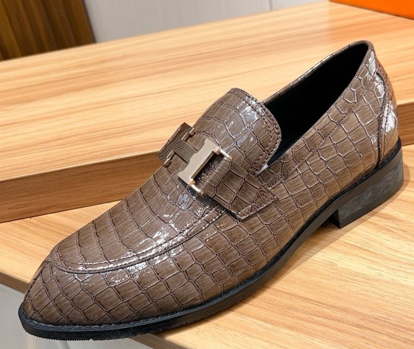 Hermès Brown Textured Loafers — front