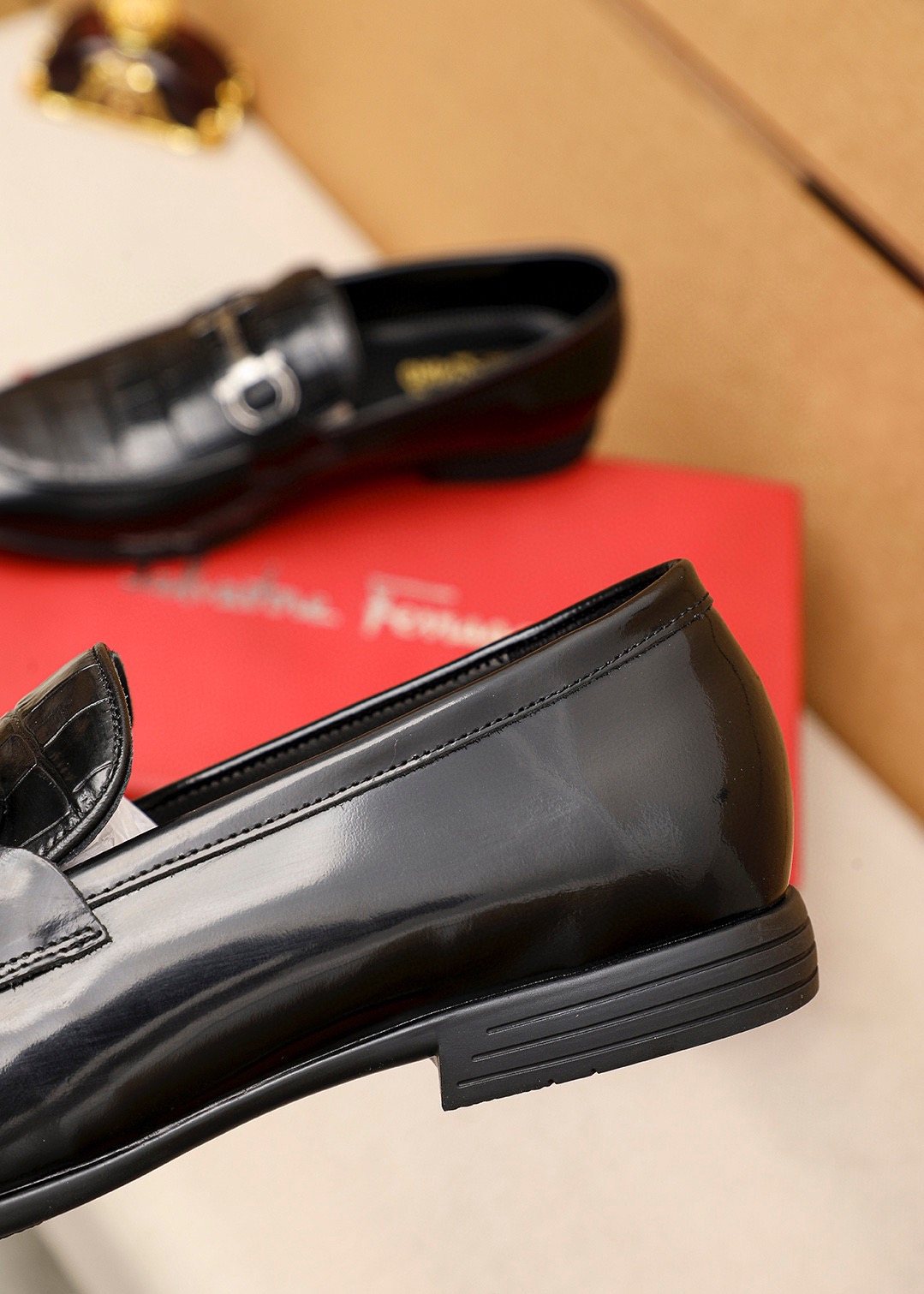 Ferragamo Black Embossed Buckle Loafers — detail