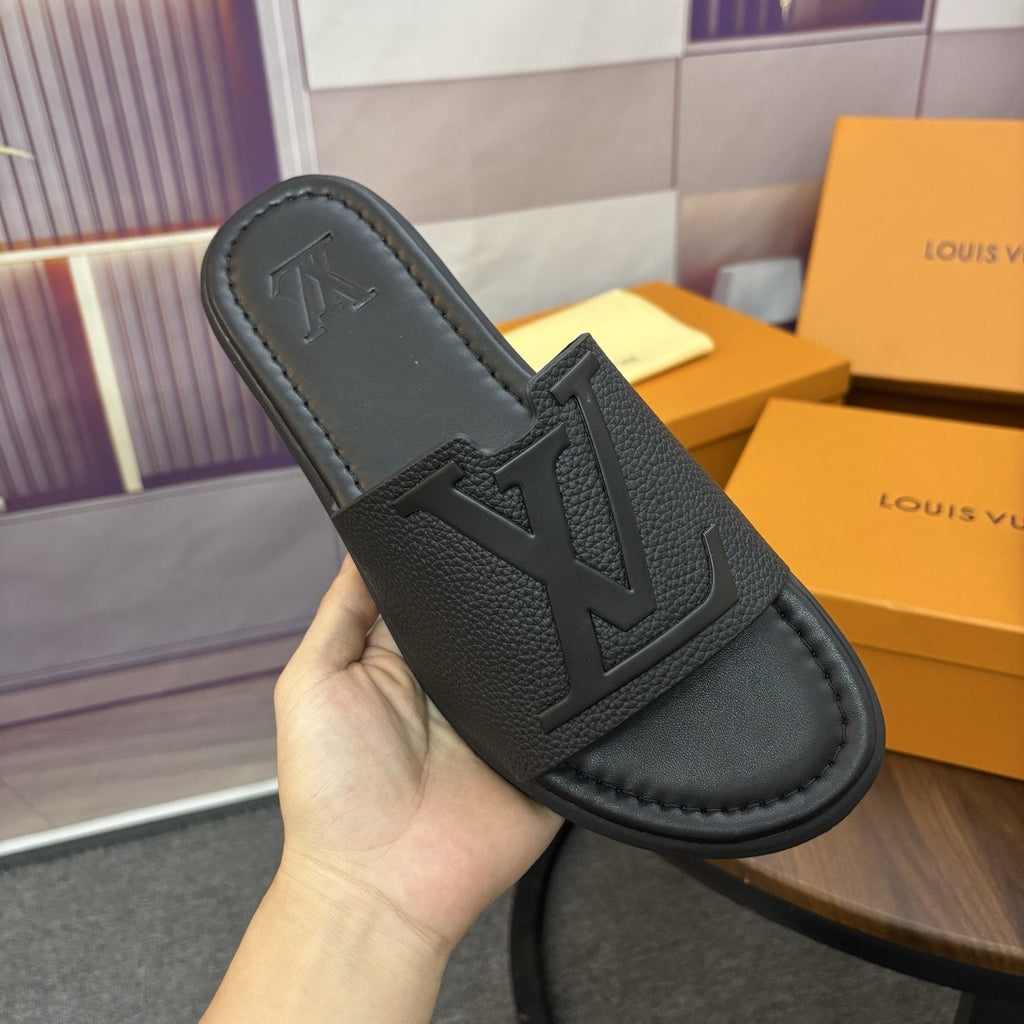 Black Embossed Slide Sandals — detail