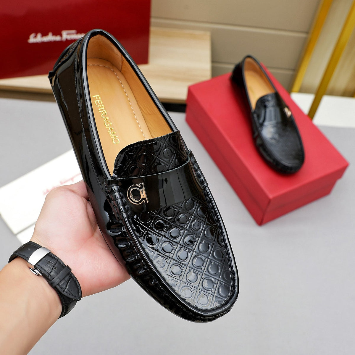 Ferragamo Black Metal-Strap Loafers — model