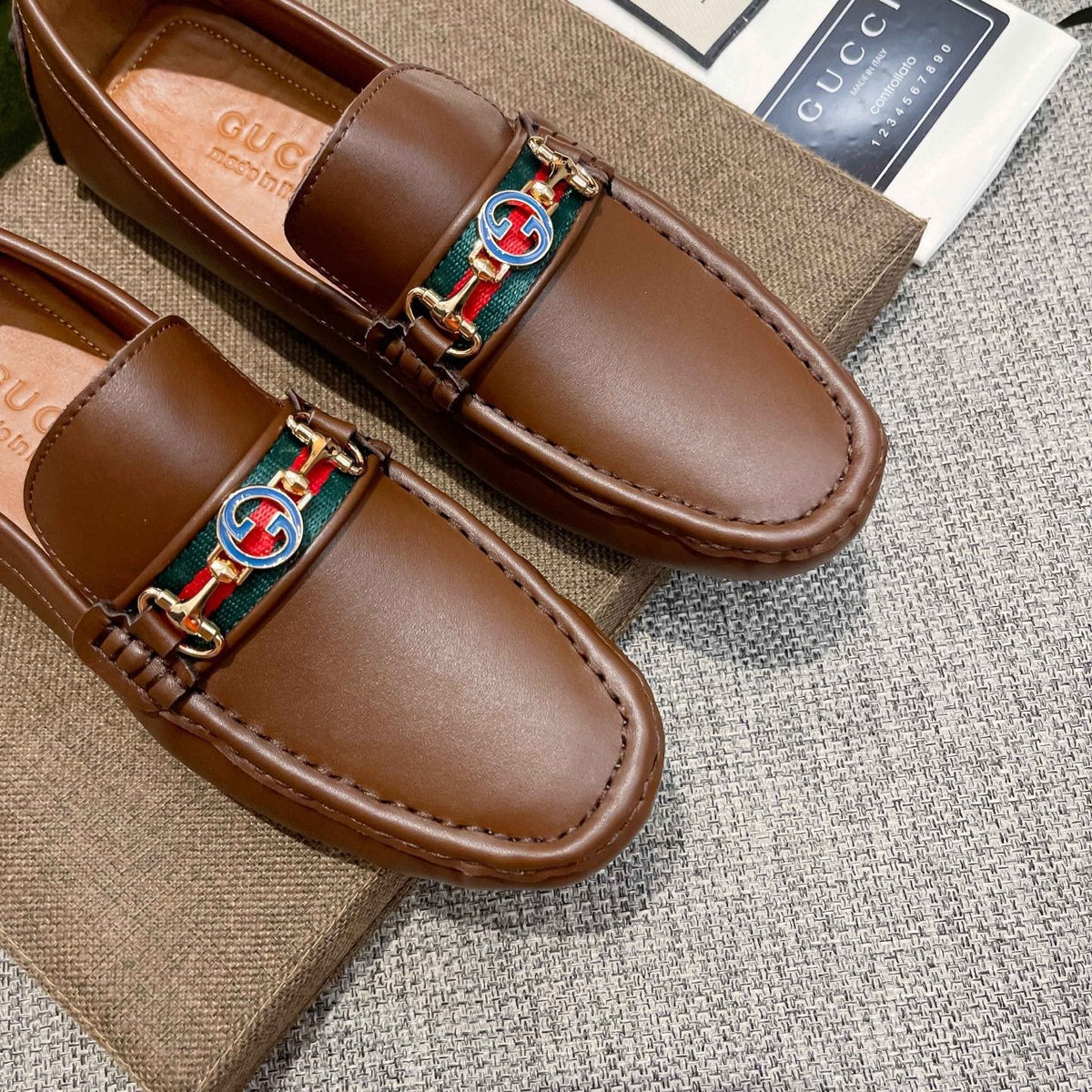 Gucci Brown Metal Hardware Loafers — front