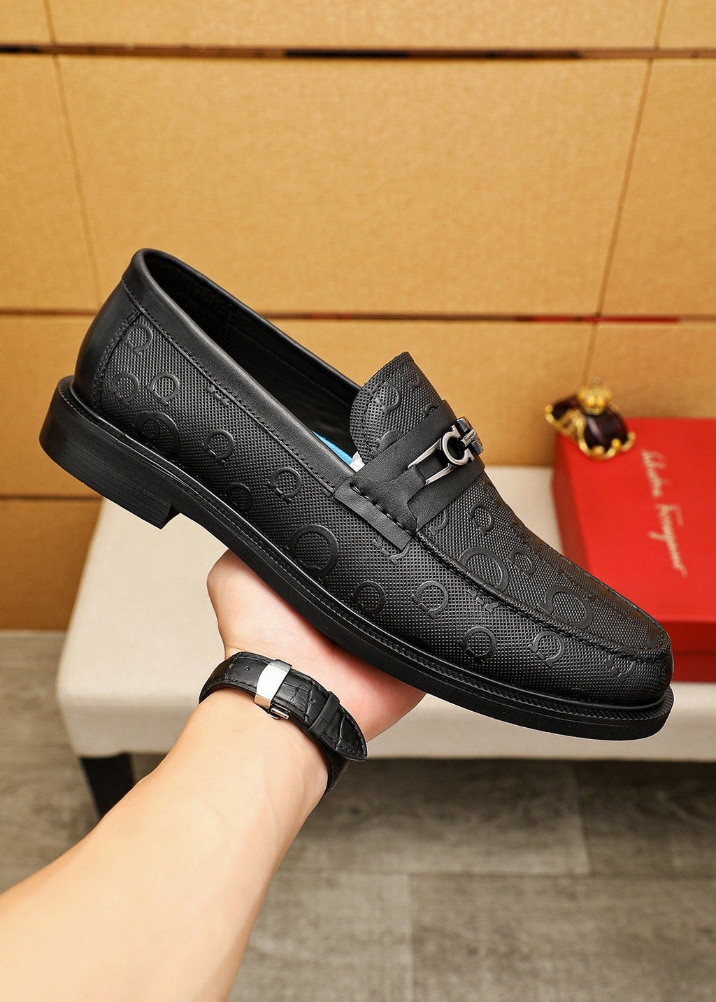 Ferragamo Black Embossed Buckle Loafers — model