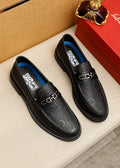 Ferragamo Black Embossed Buckle Loafers — hero