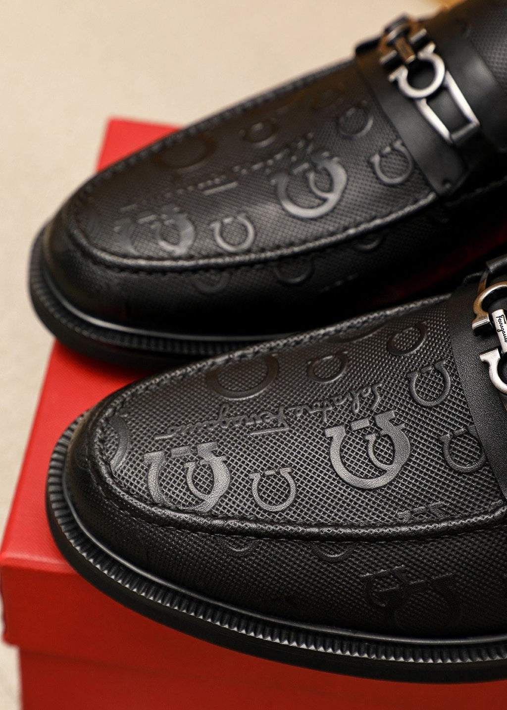 Ferragamo Black Embossed Buckle Loafers — detail