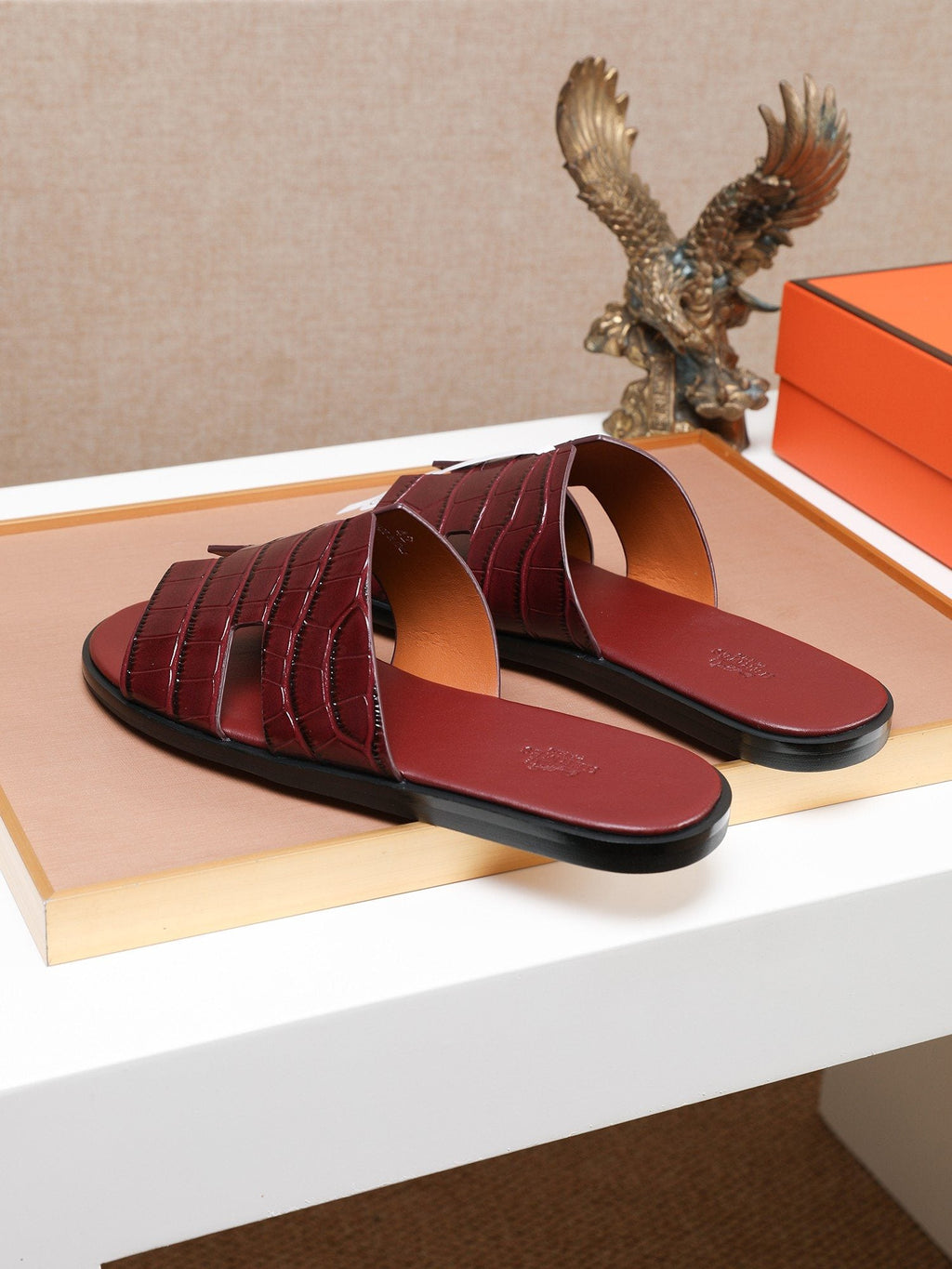 Hermès Burgundy Textured H Slide Sandals — hero