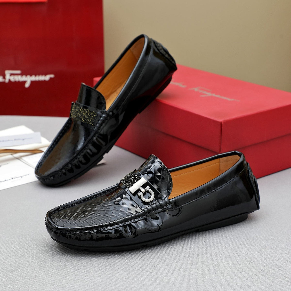 Ferragamo Black Embossed Slip-On Loafers — front