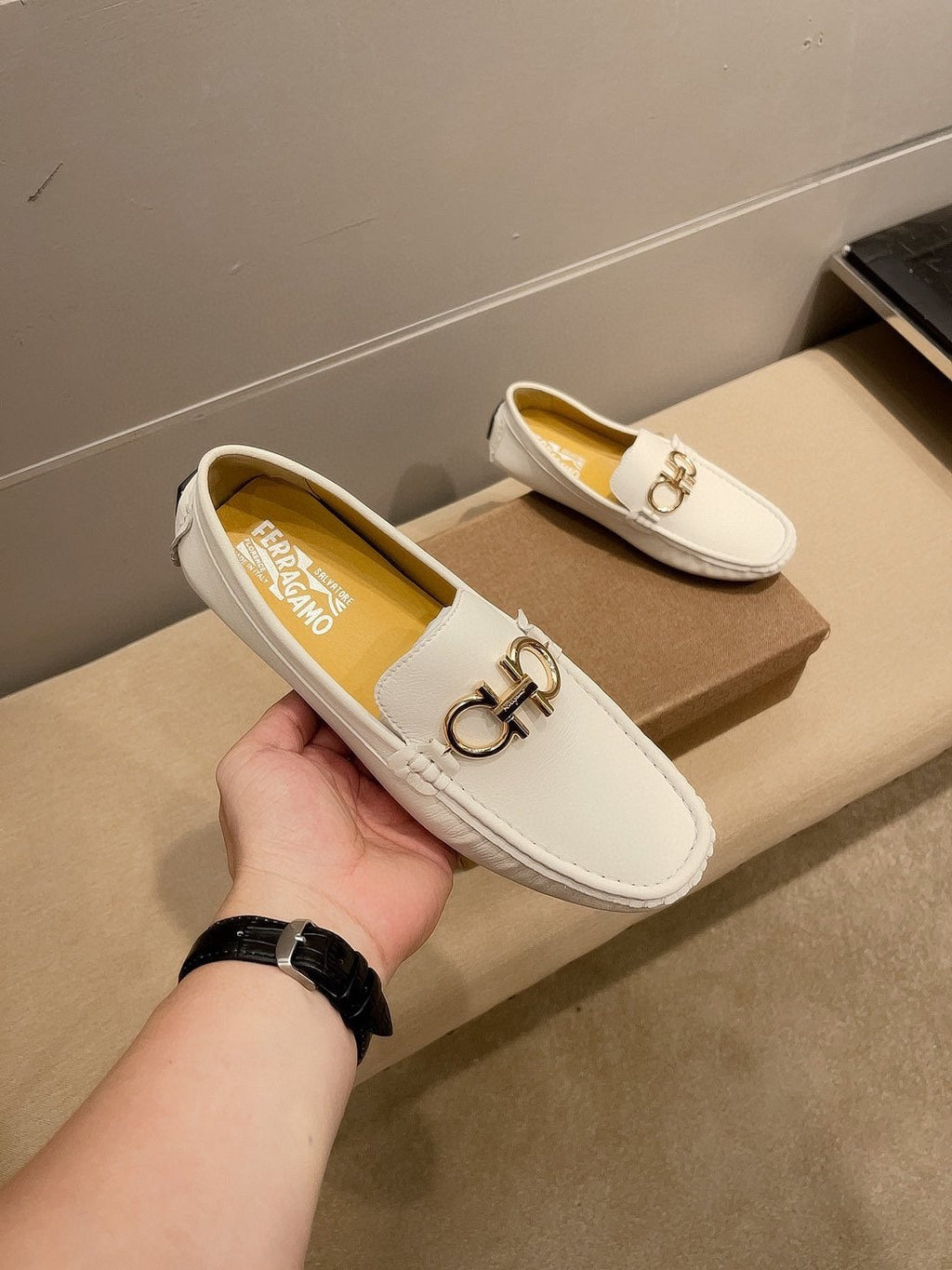 Ferragamo White Hardware Loafers — front
