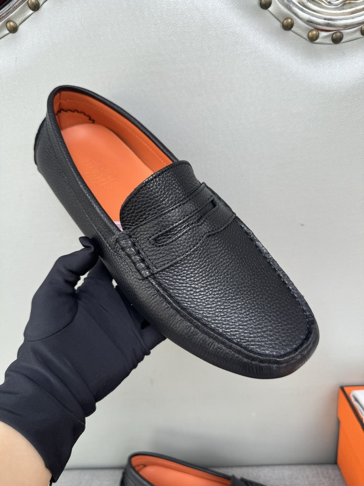Hermès Black Textured Penny Loafers — front