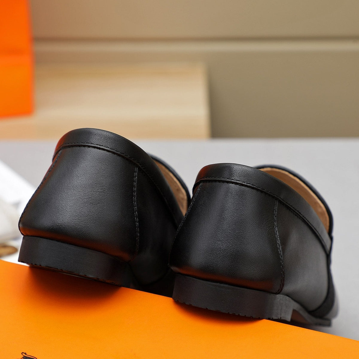 Hermès Black H-Hardware Slip-On Loafers — back