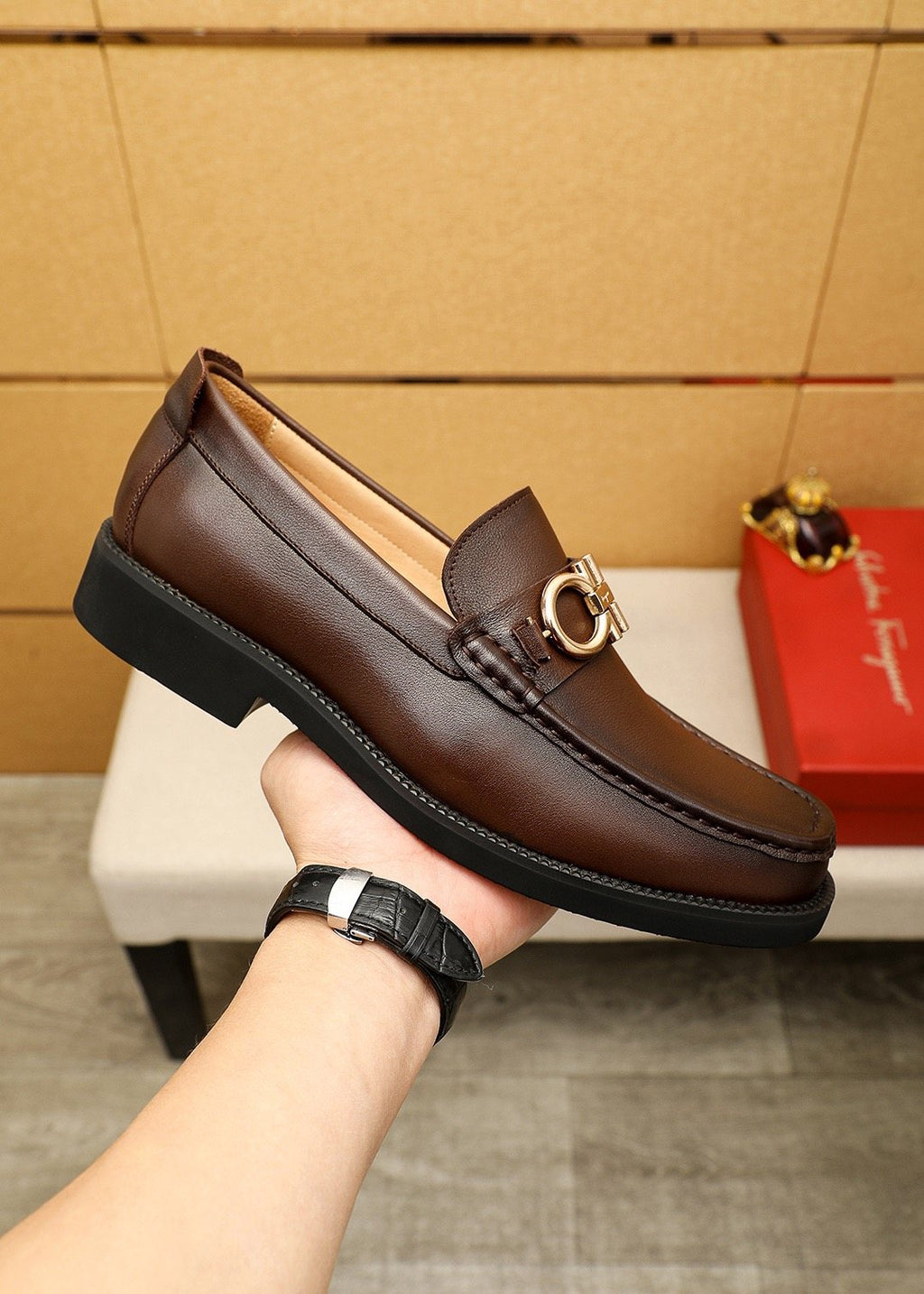 Ferragamo Dark Brown Metal-Bit Loafers — model