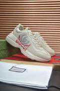 Gucci Off-White Red Accent Sneakers — hero