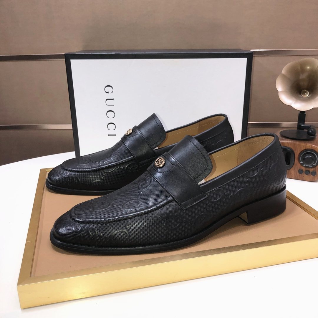 Gucci Black Embossed Leather Loafers — front