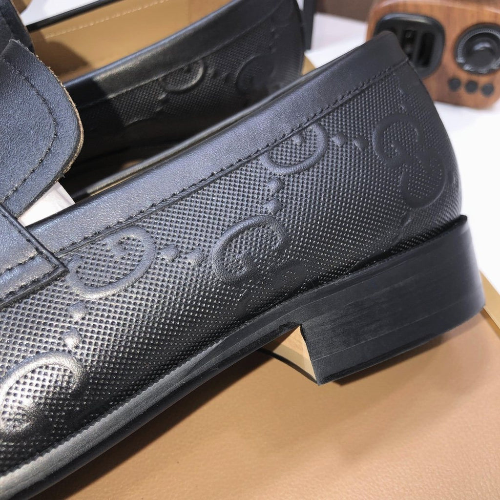 Gucci Black Embossed Leather Loafers — detail