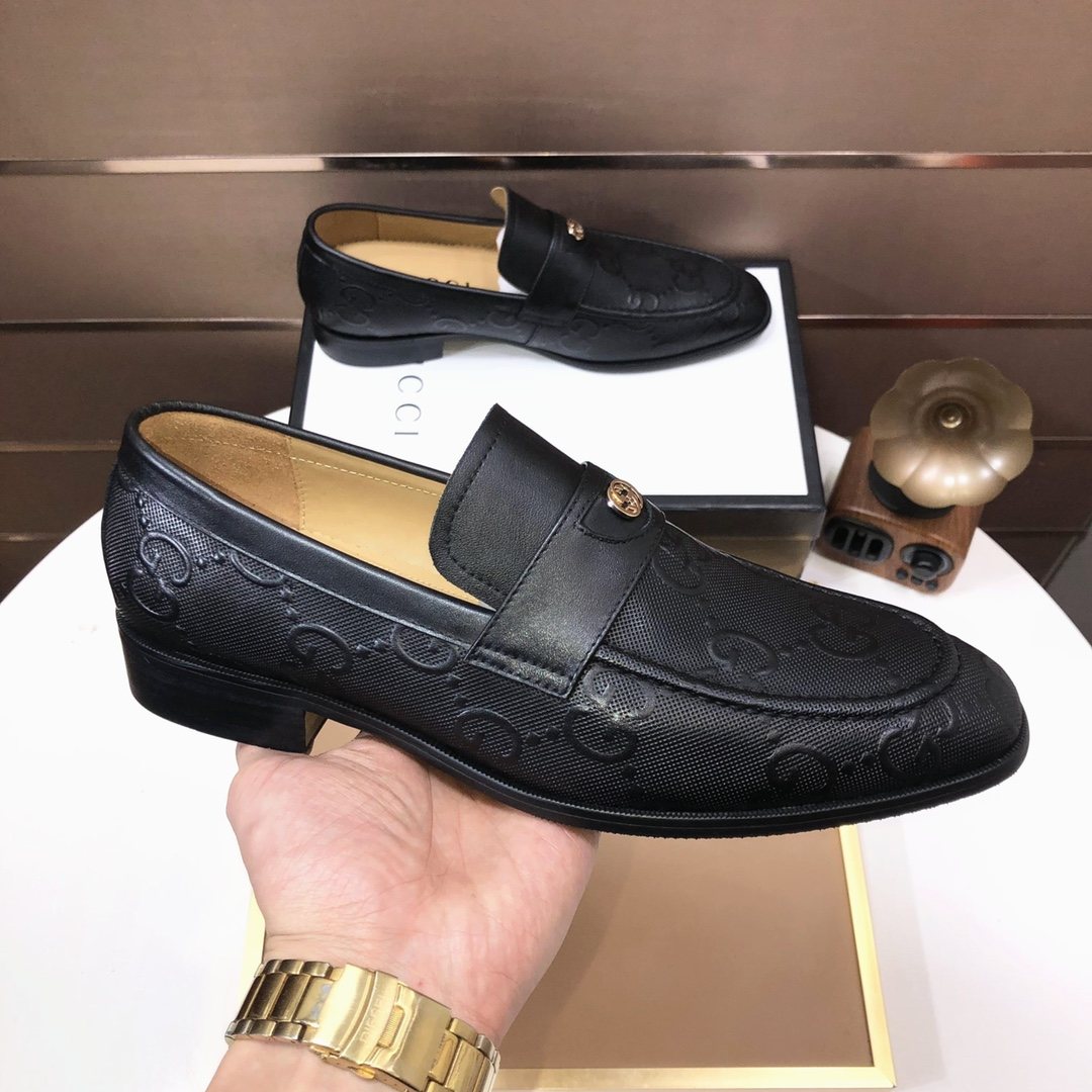 Gucci Black Embossed Leather Loafers — model