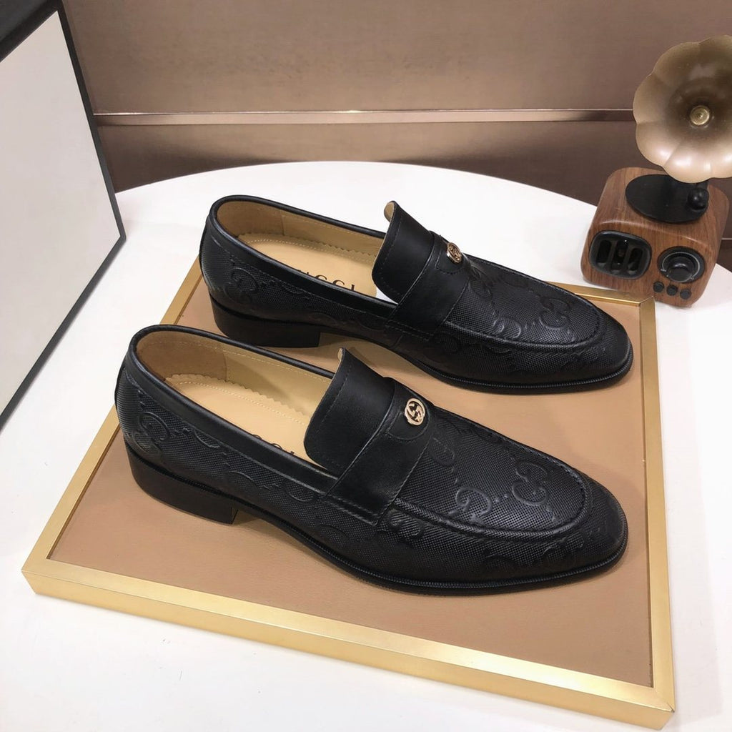 Gucci Black Embossed Leather Loafers — front