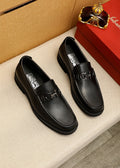 Ferragamo Black Hardware Loafers — hero