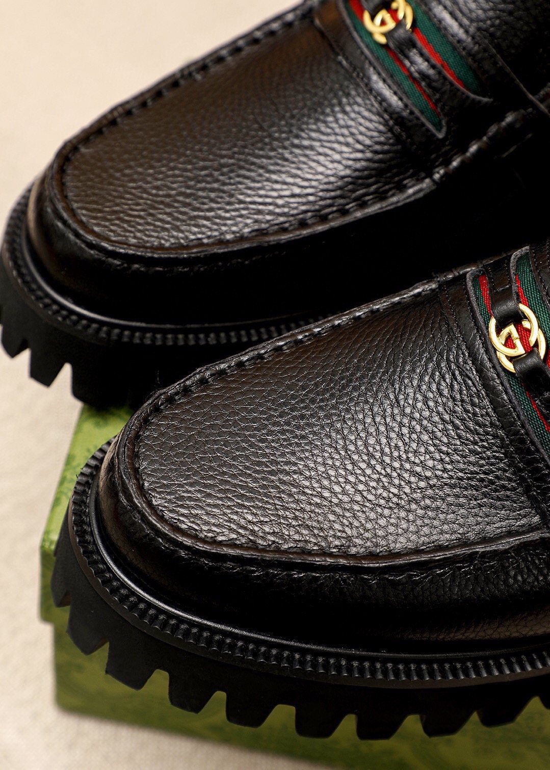 GUCCI Black Lug-Sole Loafers — detail