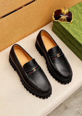 GUCCI Black Lug-Sole Loafers — hero