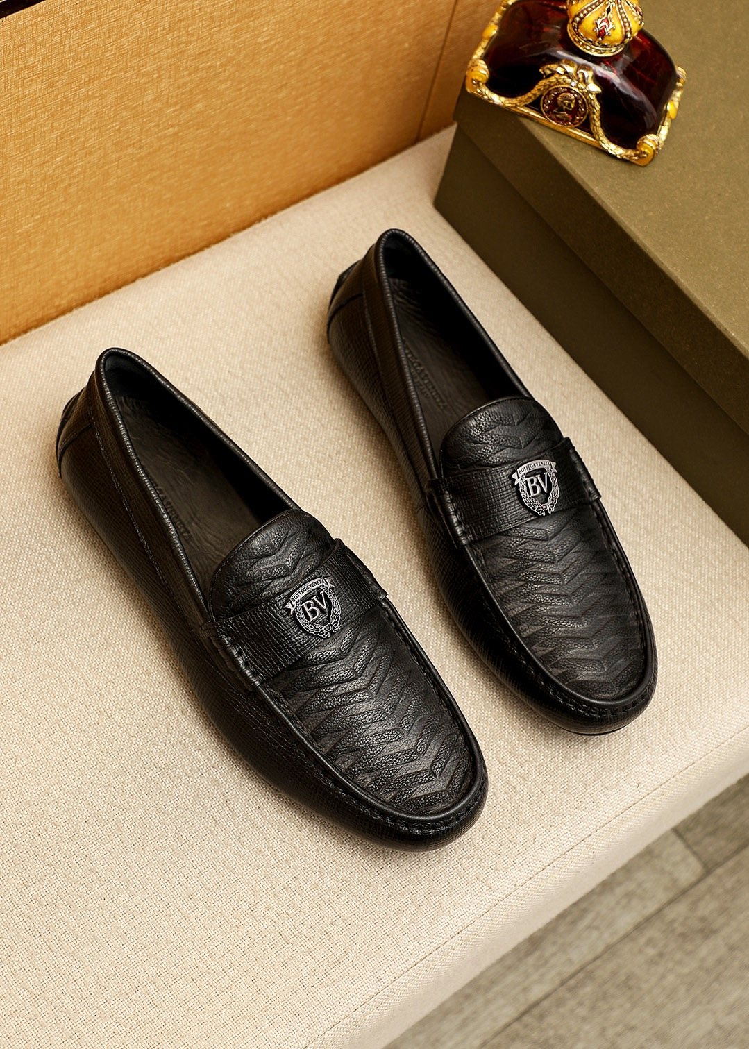 Bottega Veneta Black Textured Slip-On Loafers — hero
