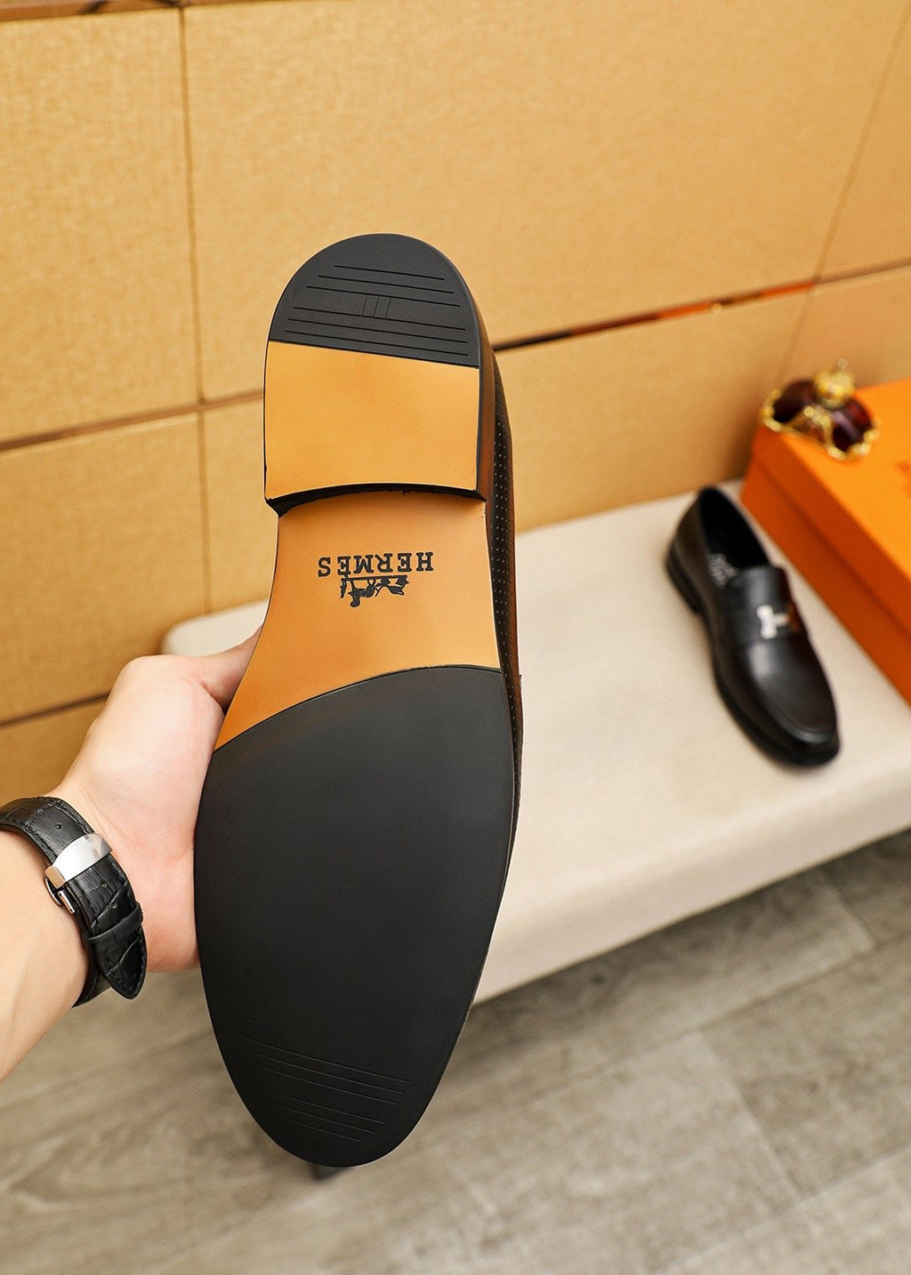 Hermès Black Perforated H-Hardware Loafers — front