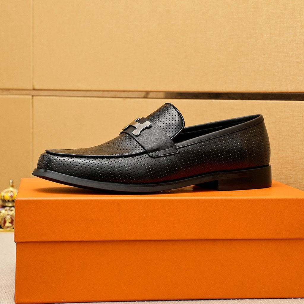 Hermès Black Perforated H-Hardware Loafers — side
