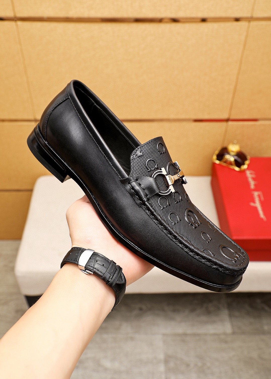 Ferragamo Black Embossed Buckle Loafers — model
