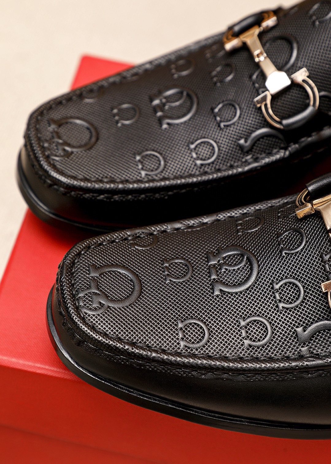 Ferragamo Black Embossed Buckle Loafers — detail