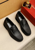 Ferragamo Black Embossed Hardware Loafers — hero