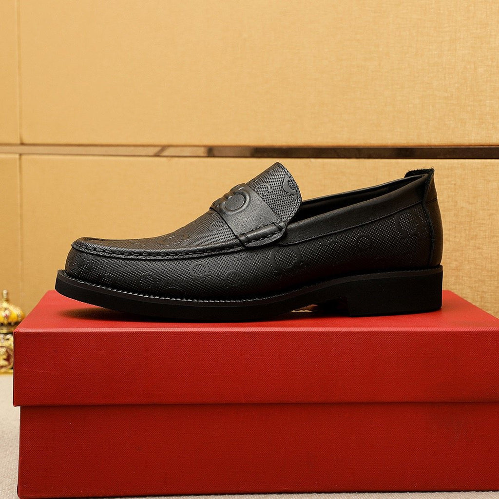 Ferragamo Black Embossed Hardware Loafers — side