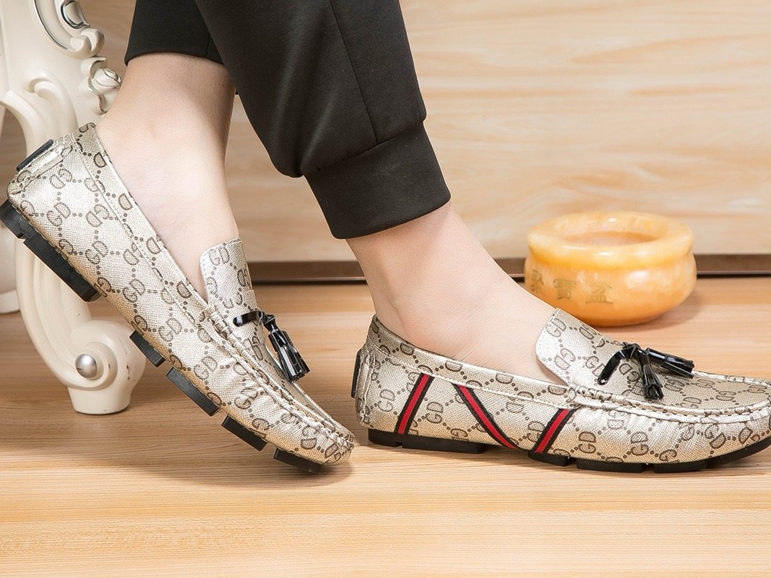 Gucci Monogram Stripe Tassel Loafers — model