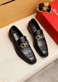 Ferragamo Black Embossed Buckle Loafers — hero