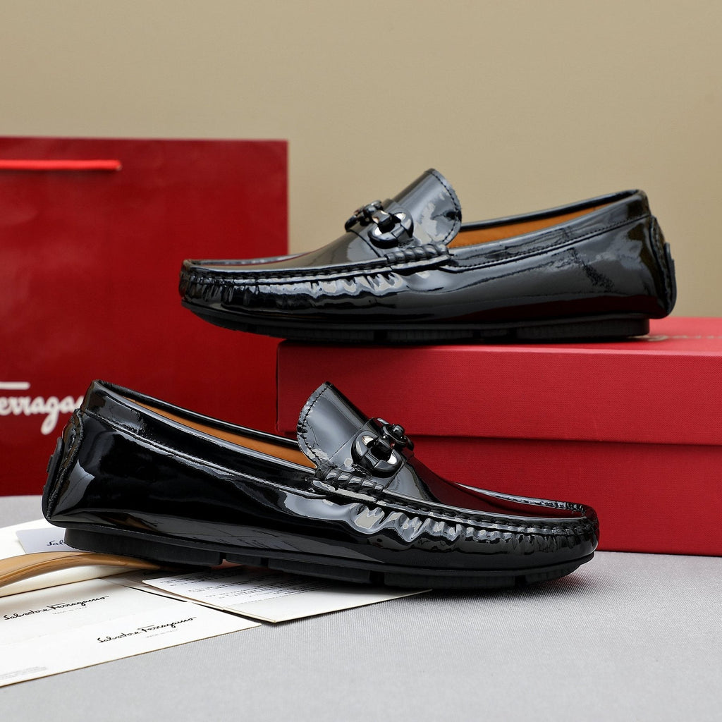 Ferragamo Black Metal Bit Loafers — front