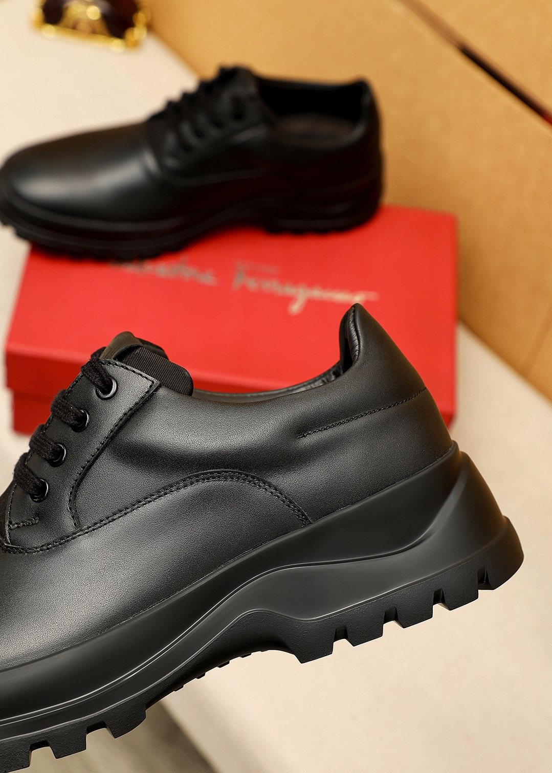 Ferragamo Black Leather Lug Sole Lace-Up Shoes — detail