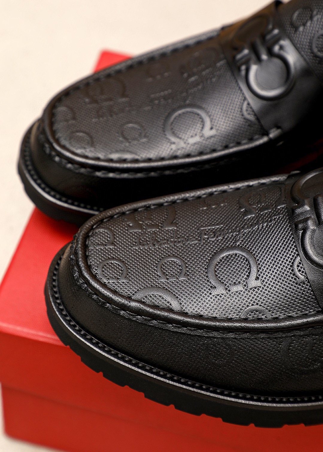 Ferragamo Black Embossed Slip-On Shoes — detail