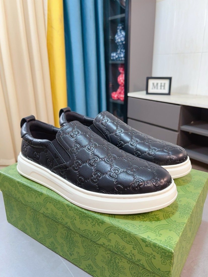 Gucci Embossed Slip-On Sneakers — front
