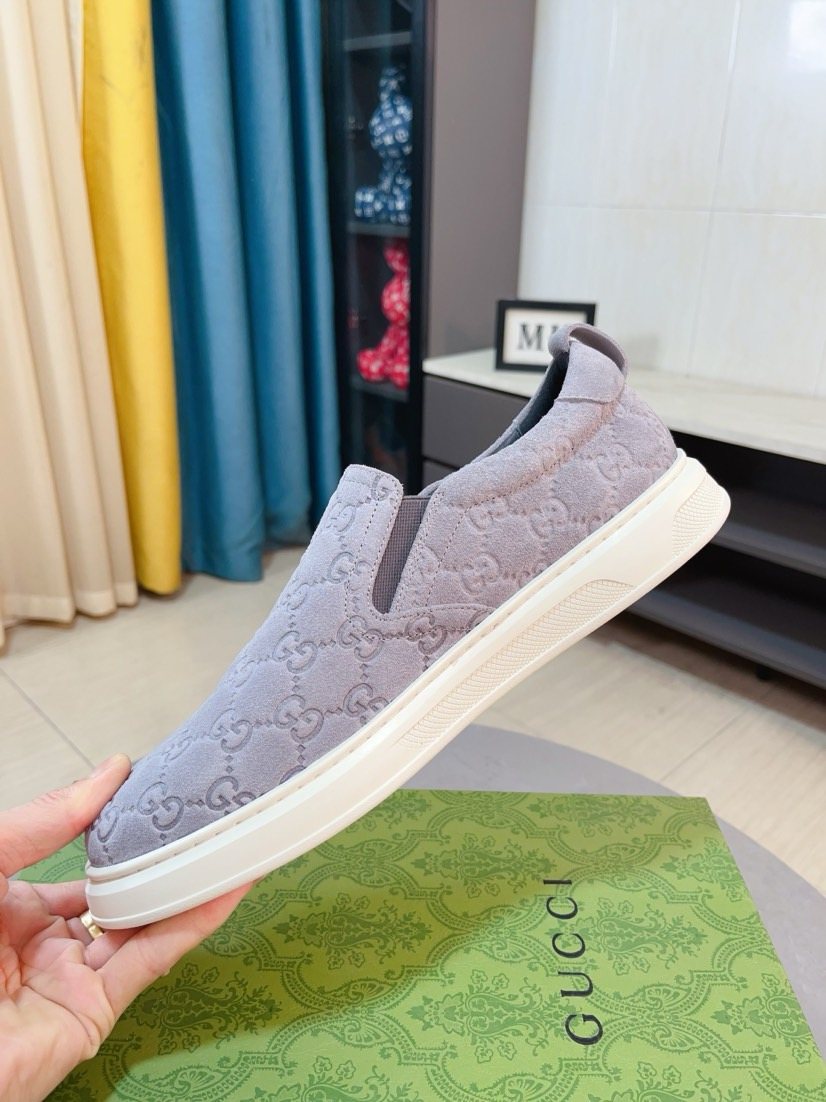 Gucci Embossed Slip-On Sneakers — detail