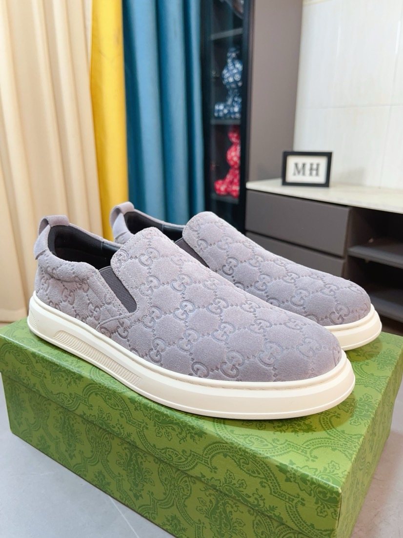 Gucci Embossed Slip-On Sneakers — side