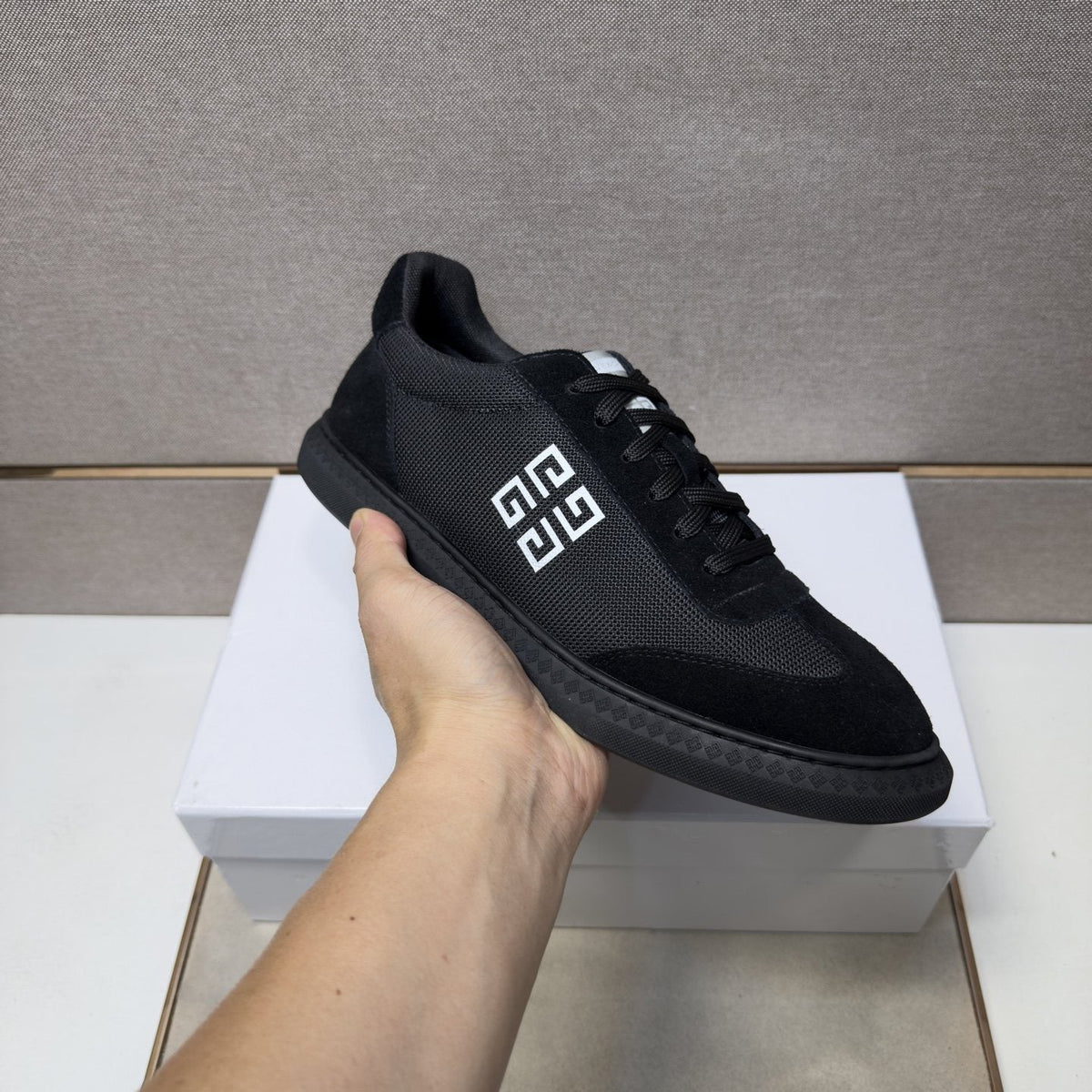 Givenchy Geometric Emblem Low-Top Sneakers — model