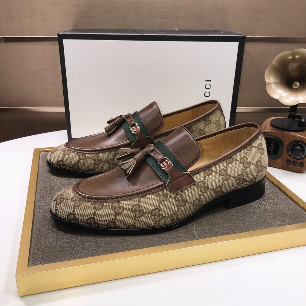 Gucci Monogram Tassel Loafers — side