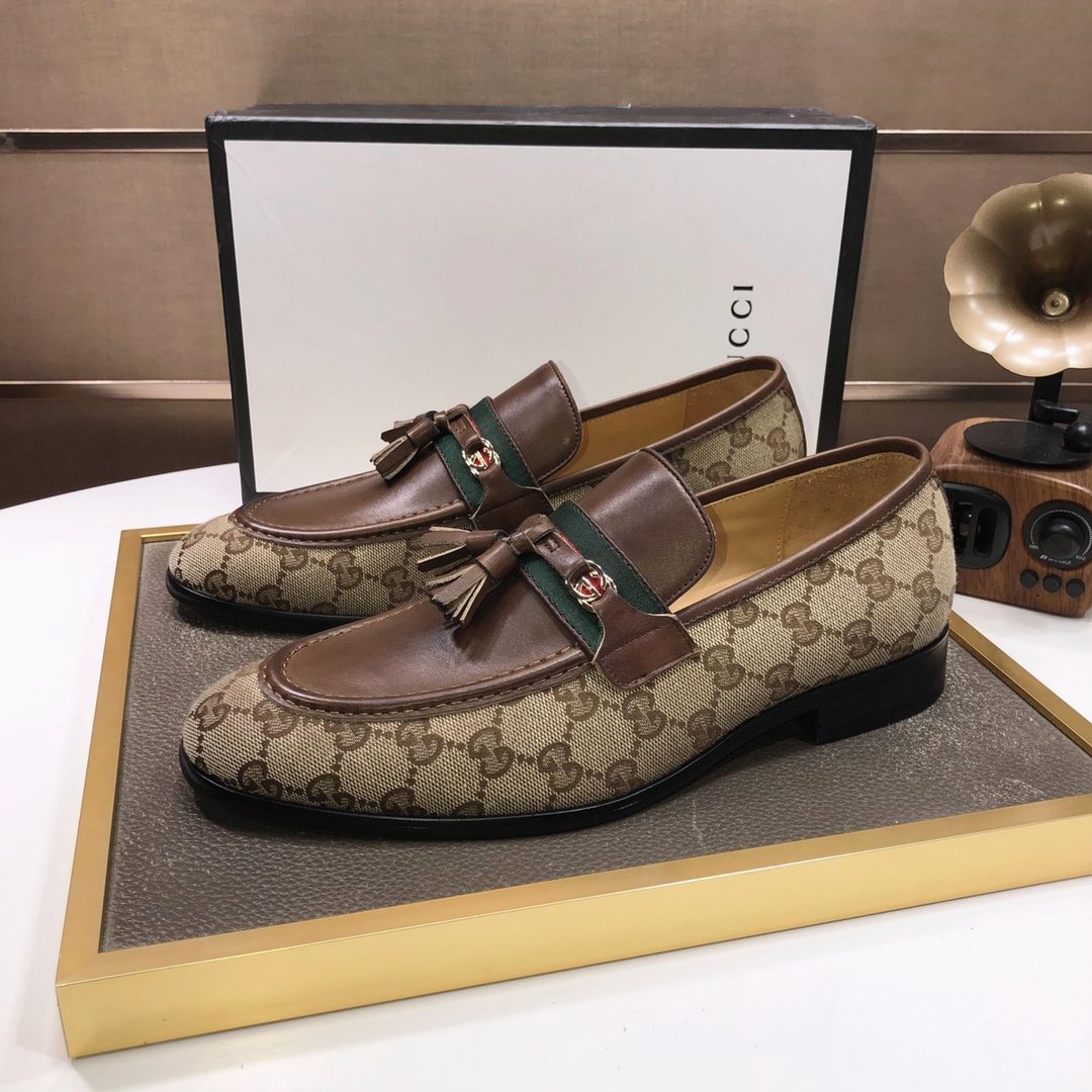 Gucci Monogram Tassel Loafers — side