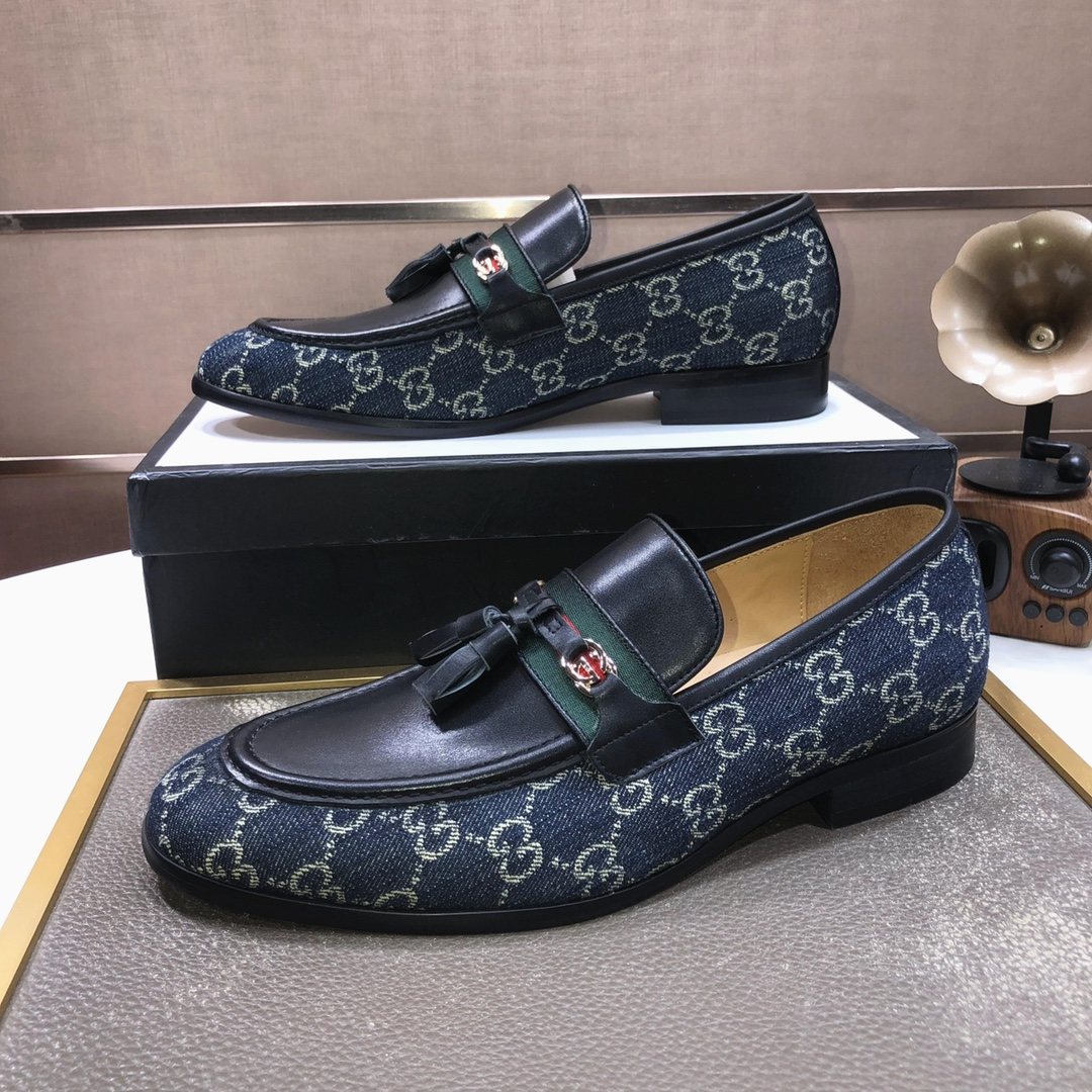 Gucci Monogram Tassel Loafers — side