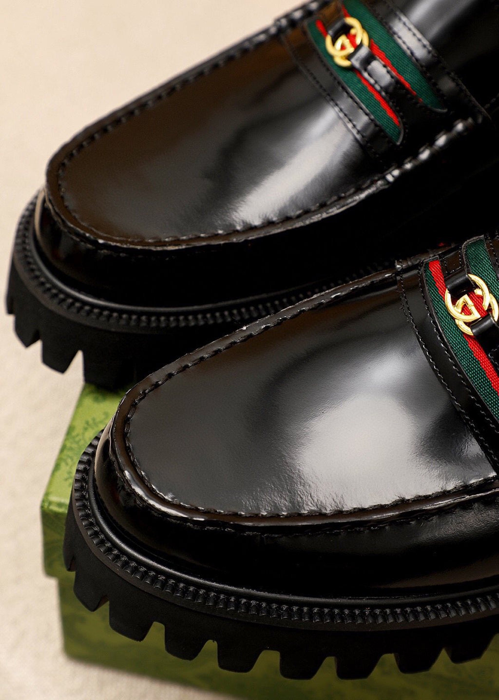 Gucci Leather Lug-Sole Loafers — detail