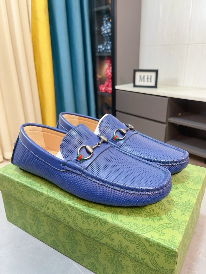 Gucci Perforated Metal Hardware Loafers — front